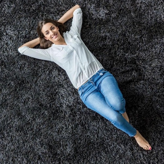 barefoot girl on carpet